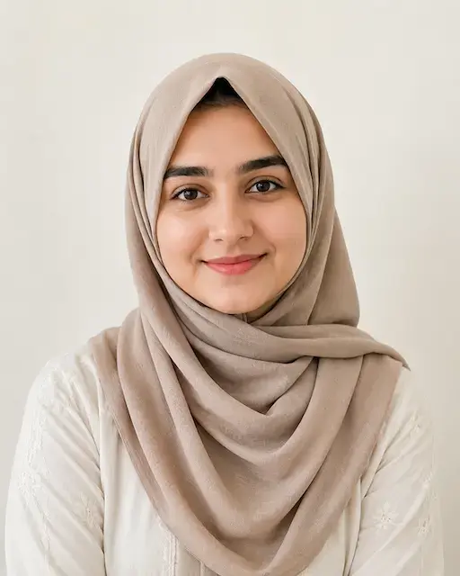 Barkat member in a beige hijab